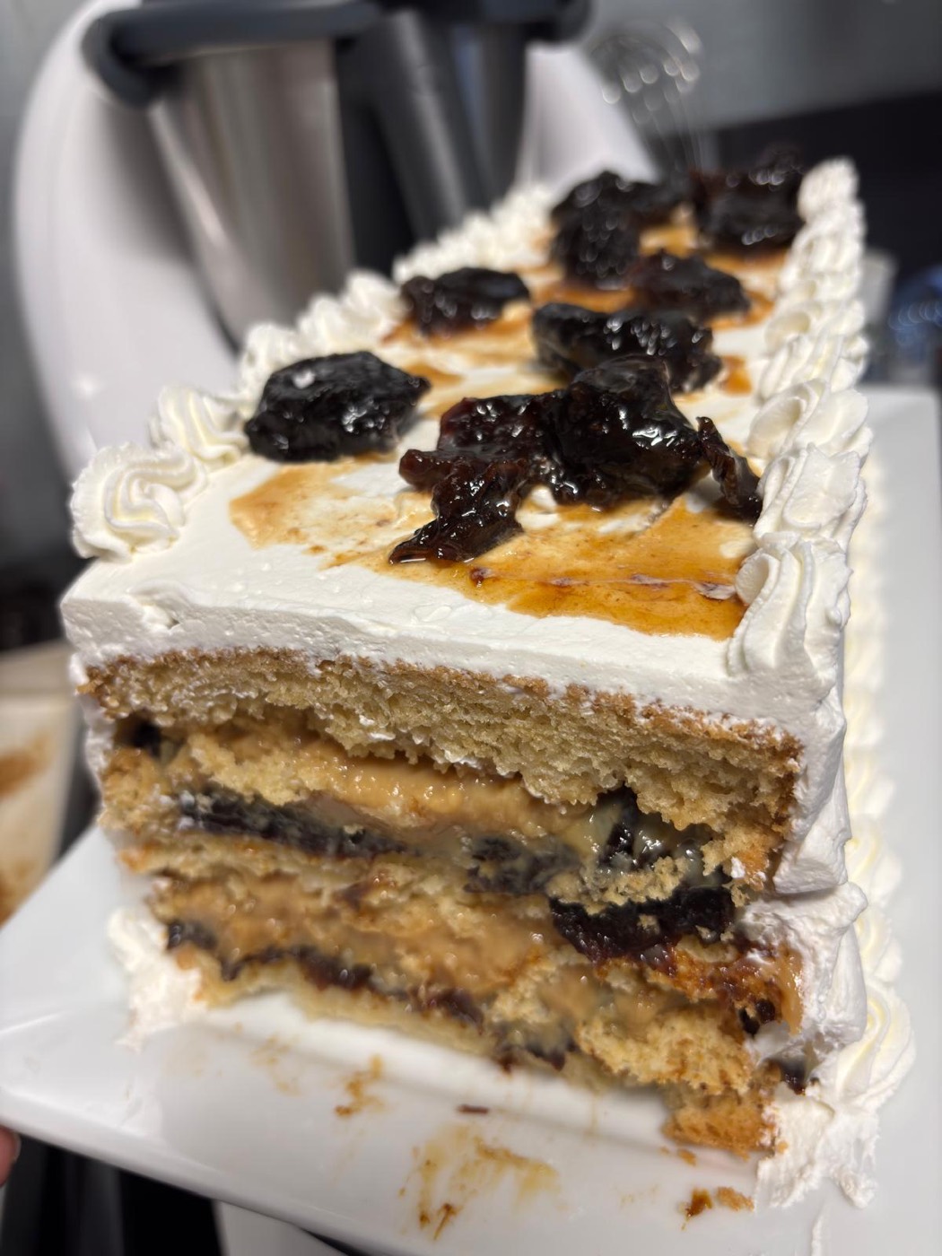 A freshly made Brazilian layer cake with cream and dulce filling at Lakcakes